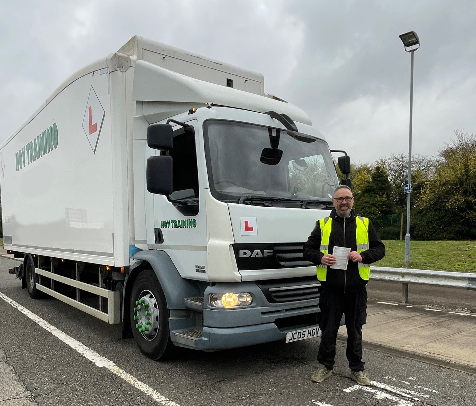 Side view of a blue training truck